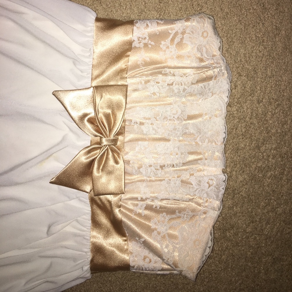 Beige bottom dress with a gold top. Strapless