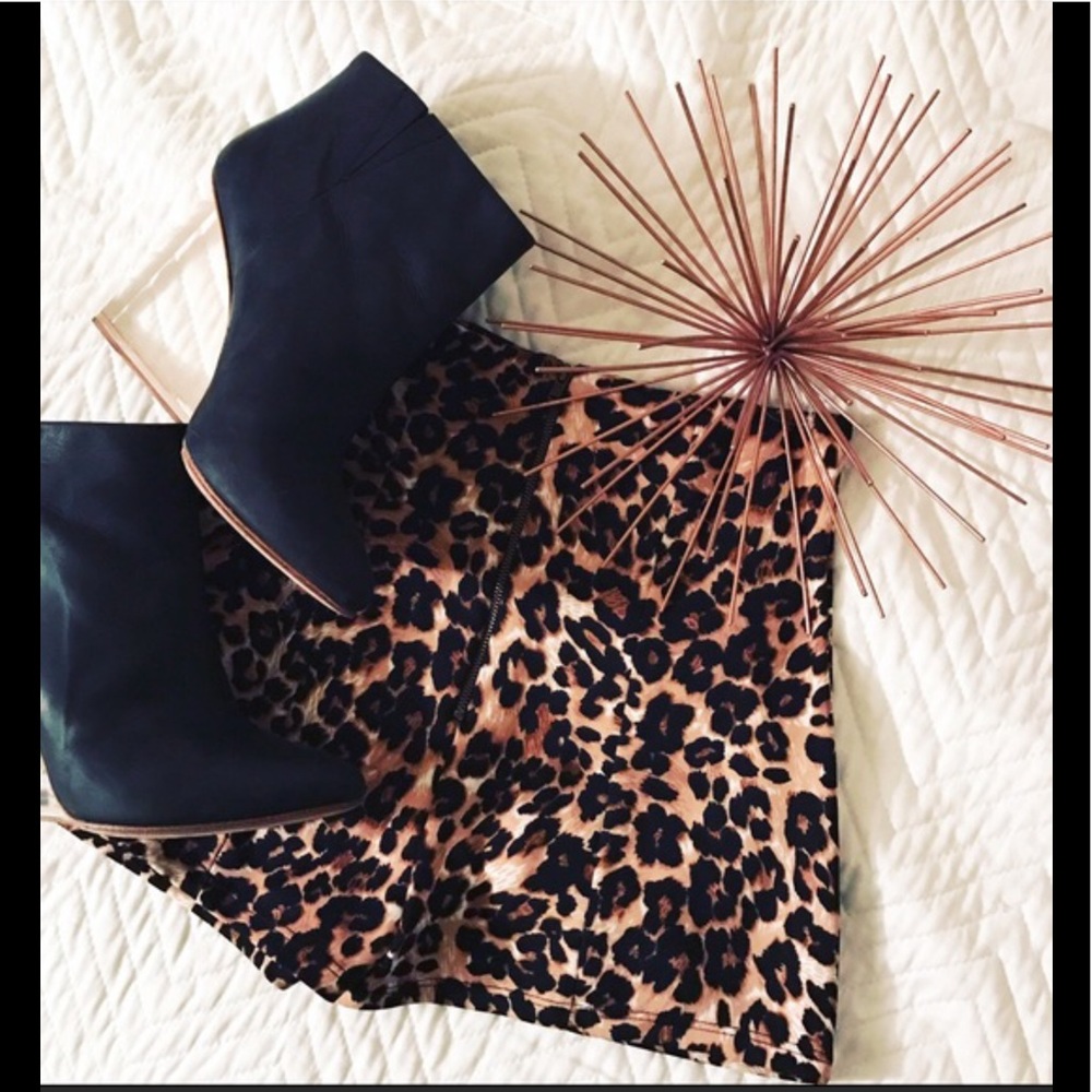 Leopard print high waisted shorts.