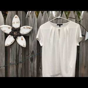 Cream colored knit top