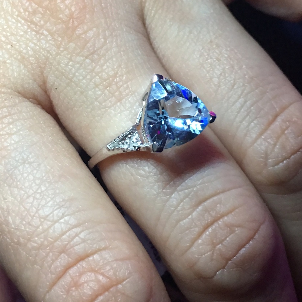 Blue topaz and diamond ring