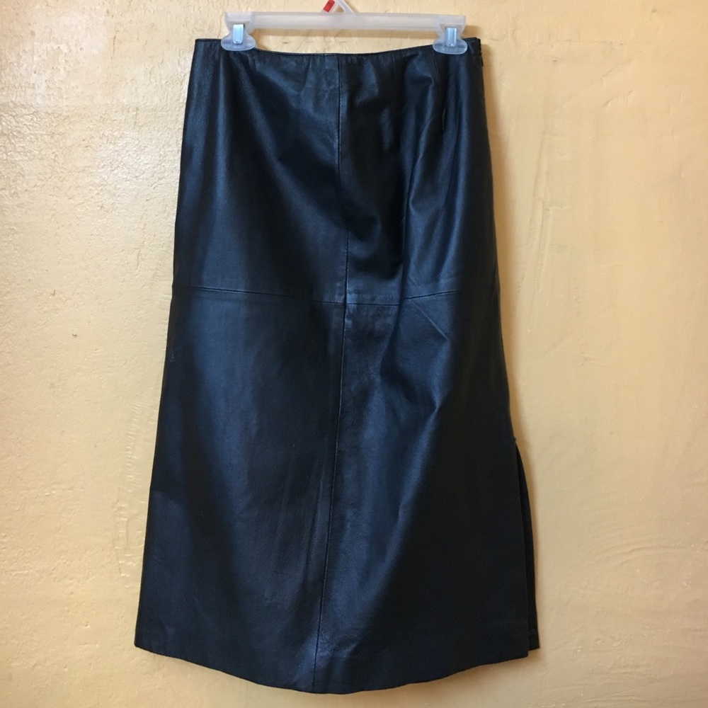 100per cent GENUINE LEATHER