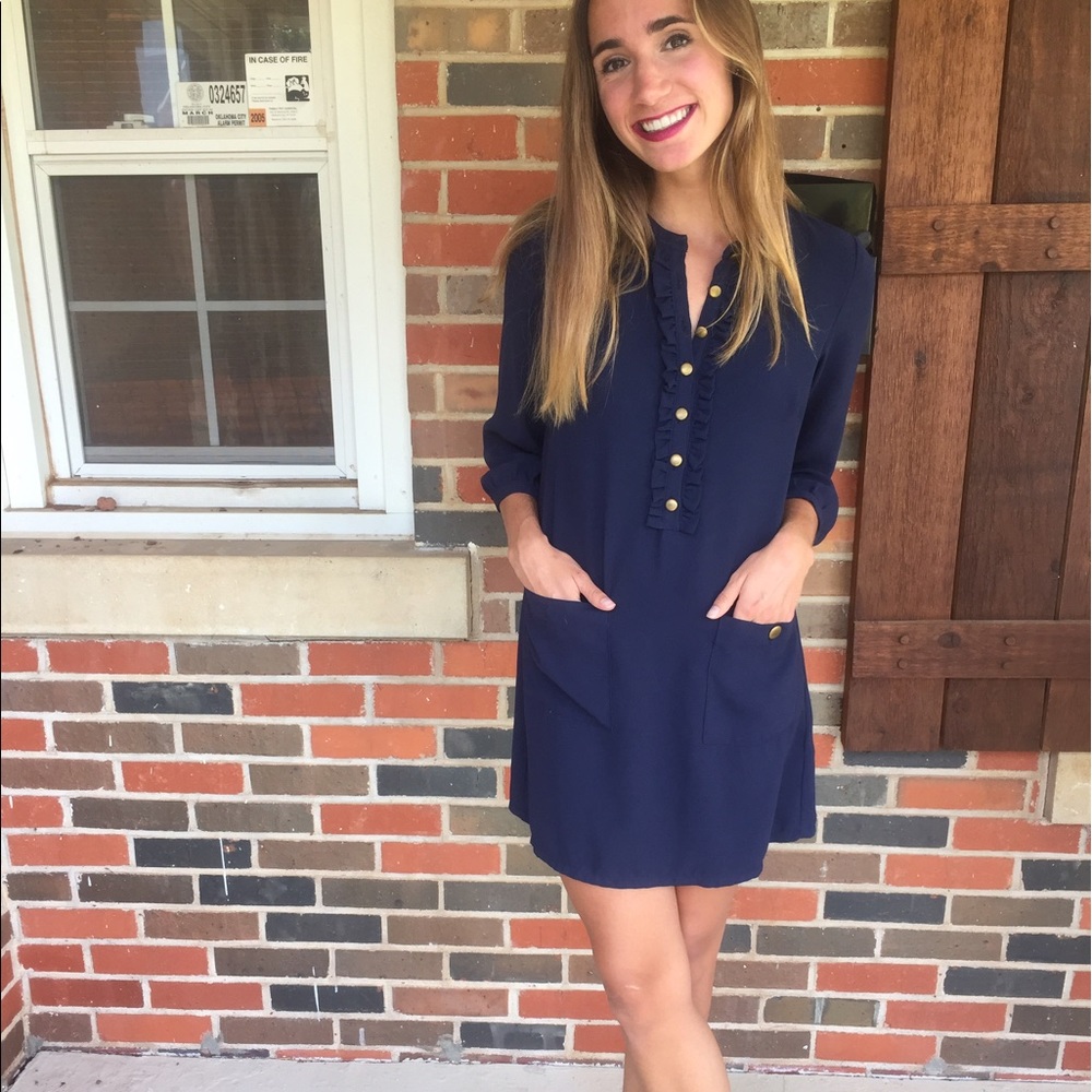 Blue long sleeved dress with ruffles
