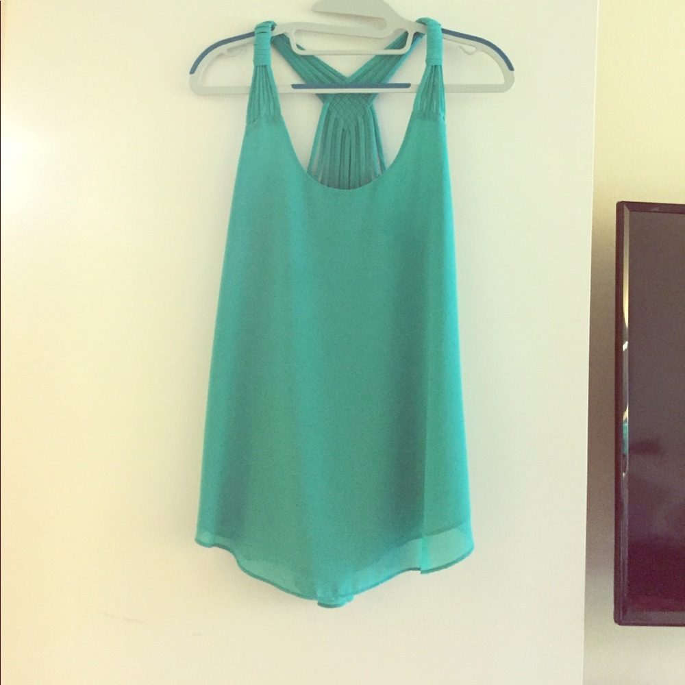 Turquoise flowy cross back tank