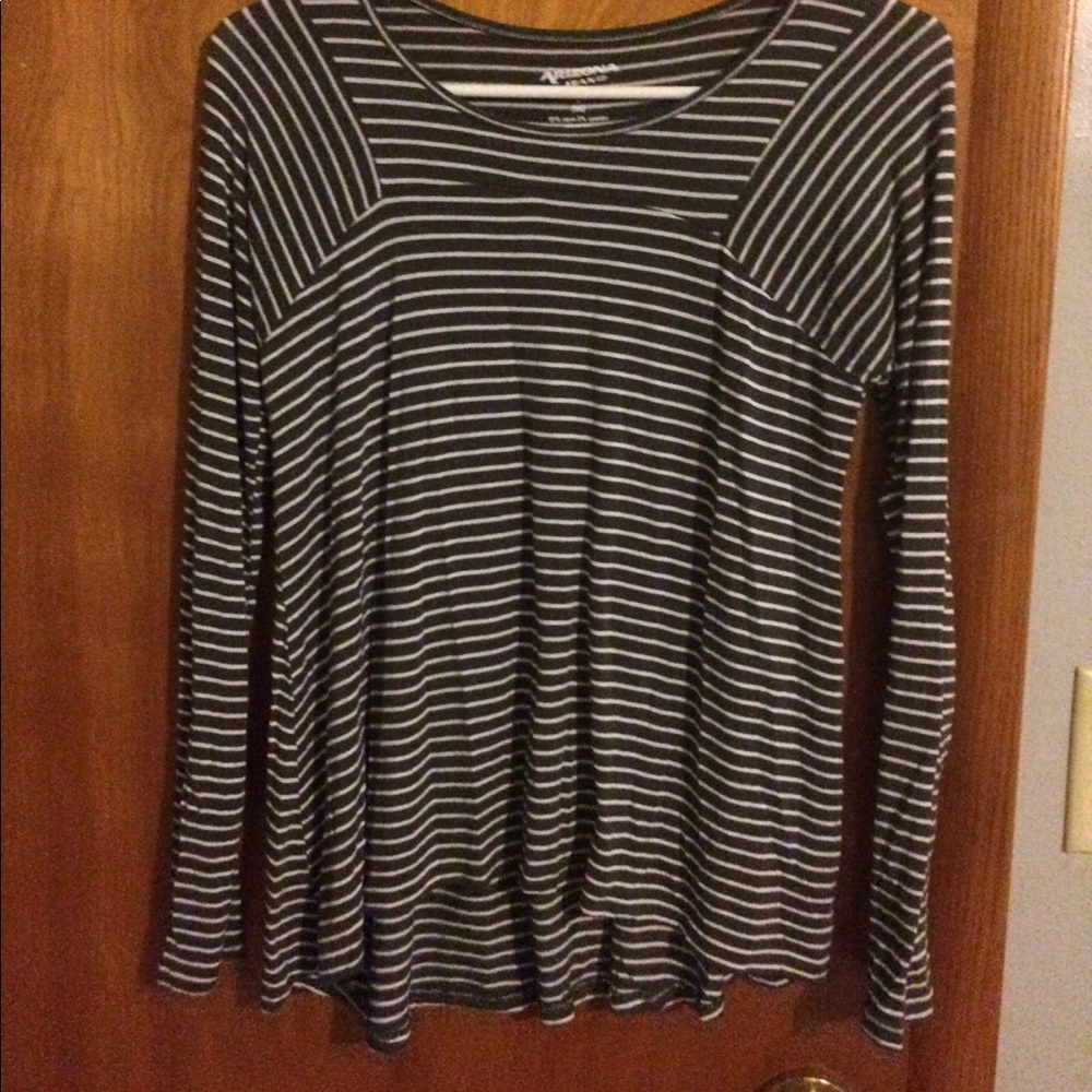 A grey and white long sleeve shirt