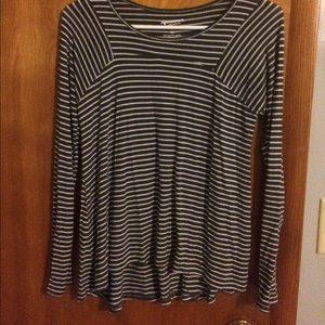 A grey and white long sleeve shirt