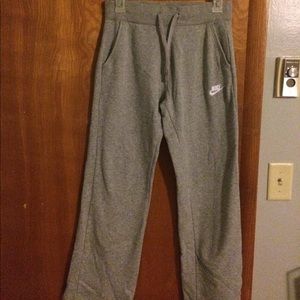 Gray Nike sweat pants.