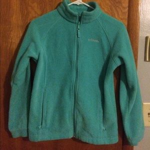 A blue Columbia zip-up jacket