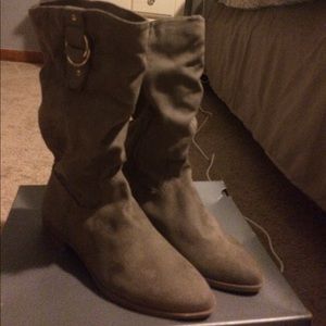 Tanish grey boots that have never been worn before