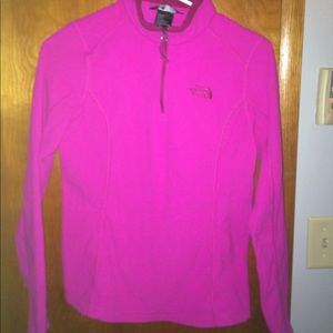A pink quarter-zip north face