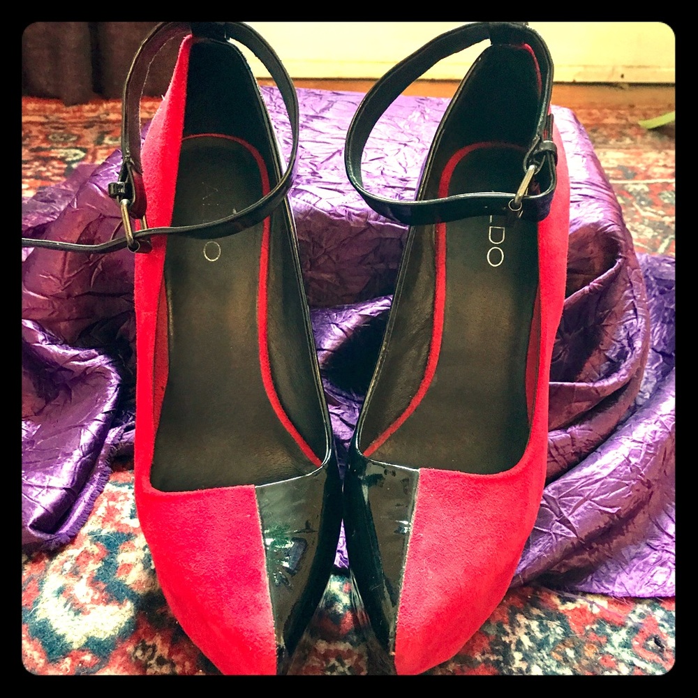 Half black pleather, half red valor platforms.