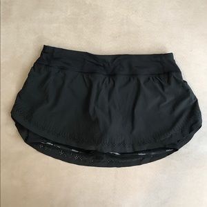 Never worn Lululemon black running skirt