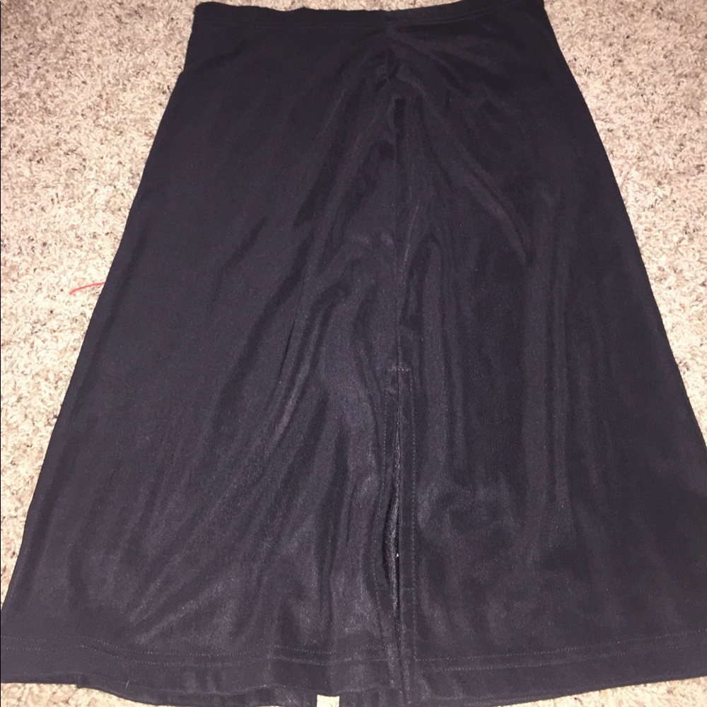 Black skirt size small. Front/back slits