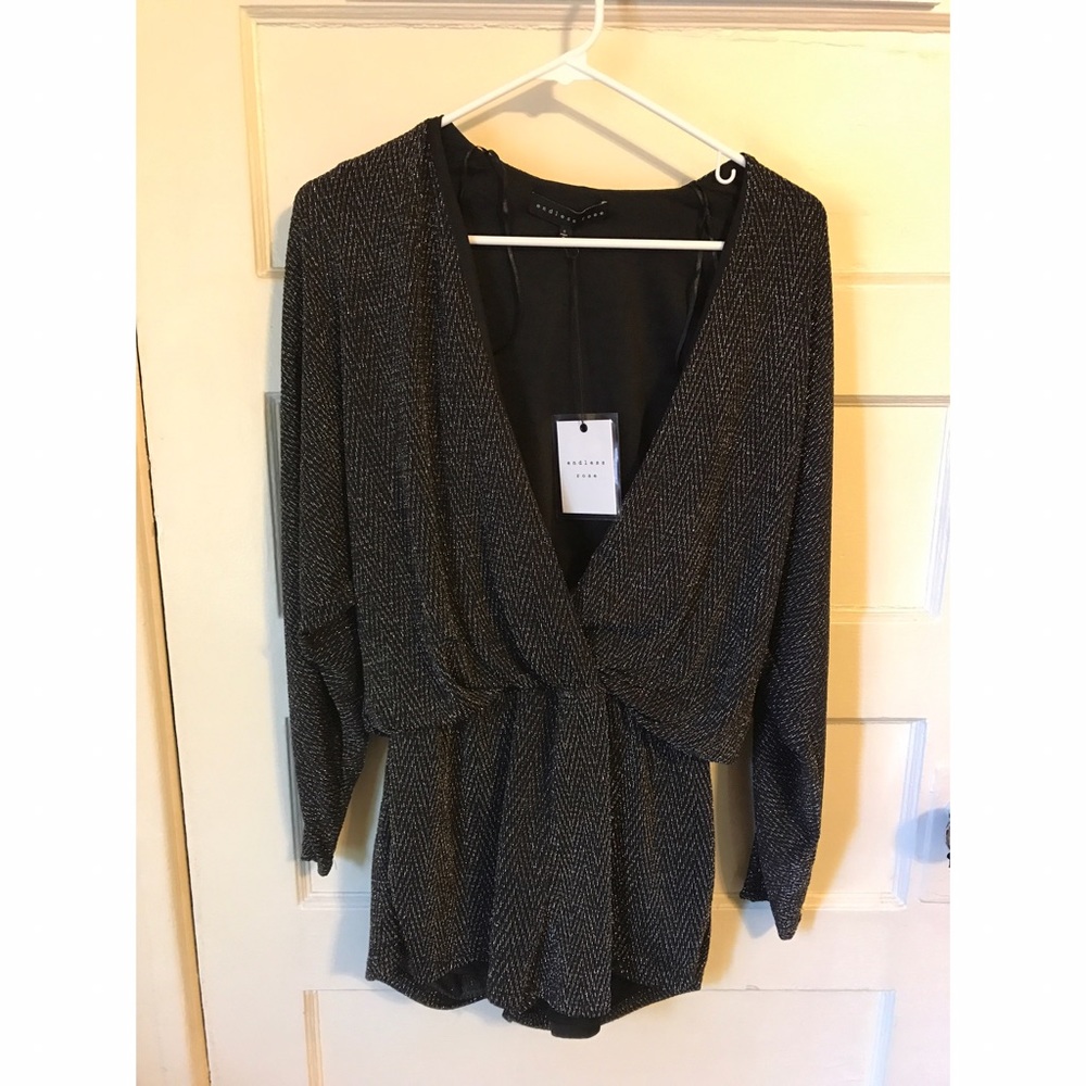 Black and silver long sleeve romper