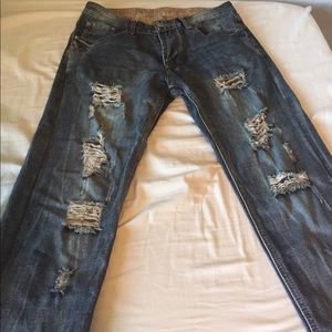Distressed faded jeans size 31