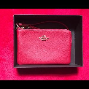 COACH wristlet cross grain leather red