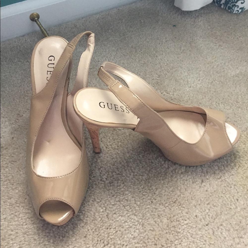 Nude sling back heels with a cork heel