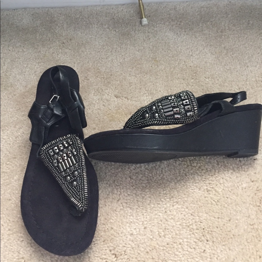 Black sandals with wedge heel