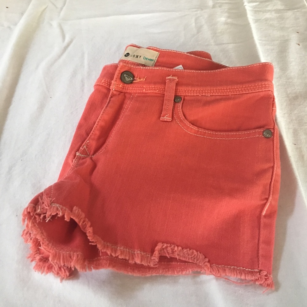 Salmon colored jean shorts