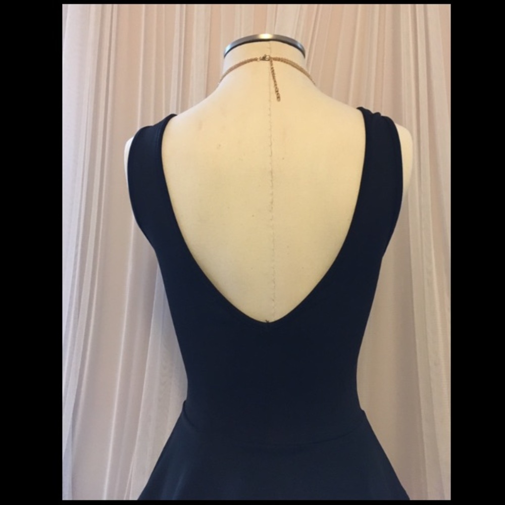Black peplum top with shear deep v - Picture 2 of 2