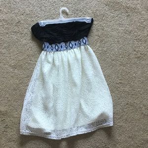 Flowy black and white strapless dress