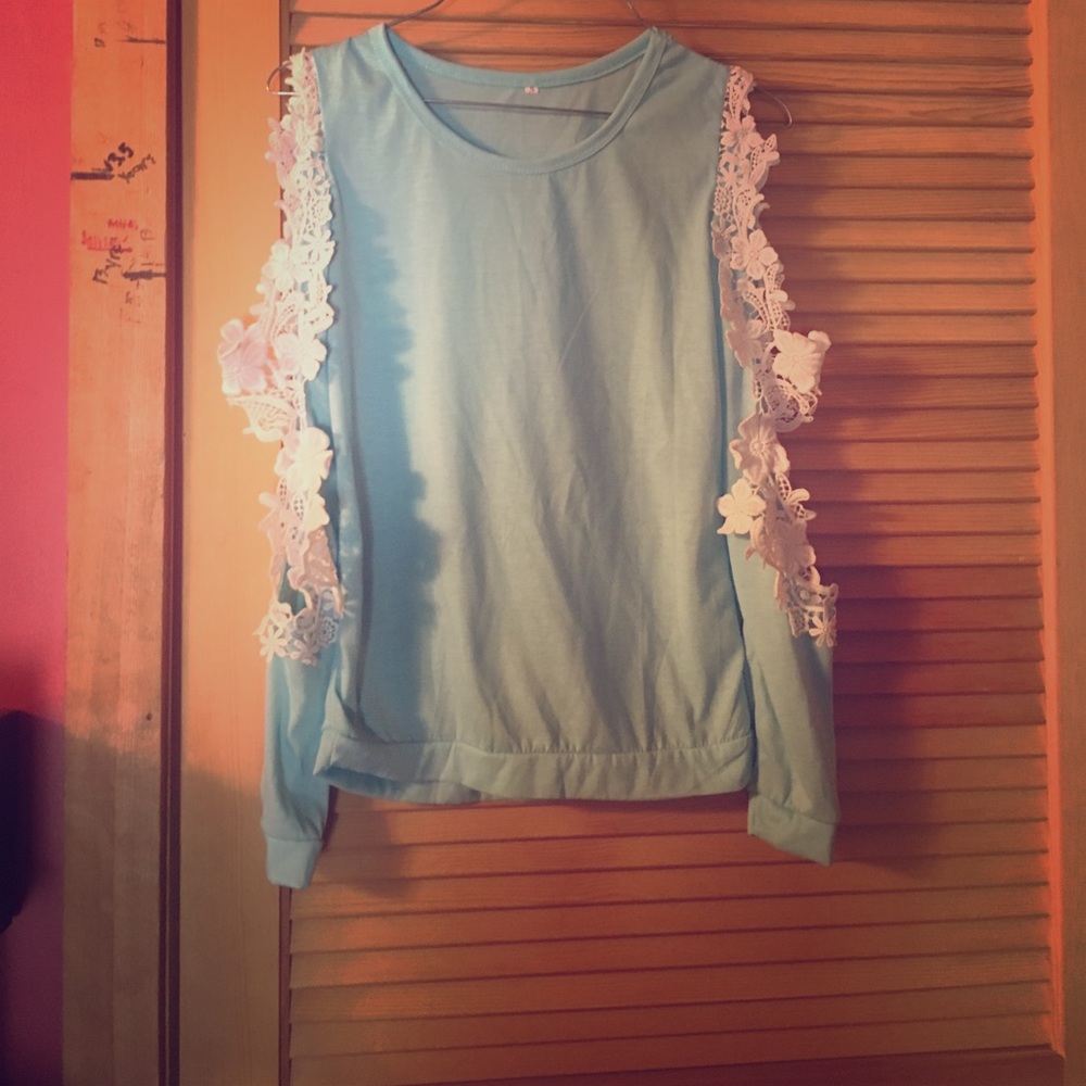 Brand new without tags flower sleeved top.