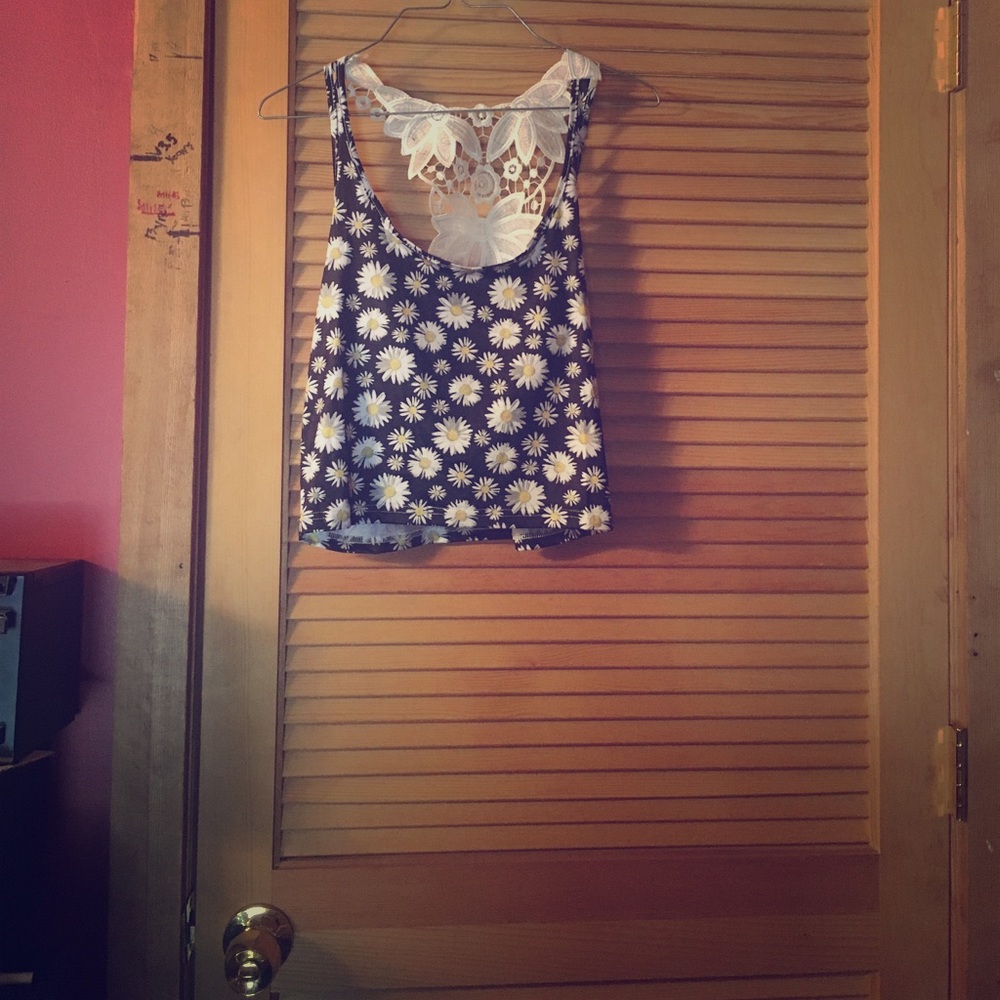 Brand new without tags. Cute daisy crop top!