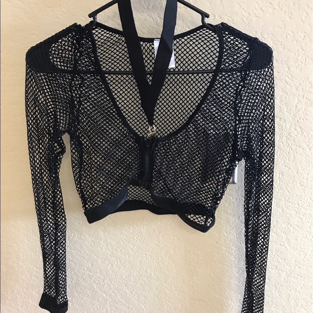 Mesh / fishnet matching top and skirt .