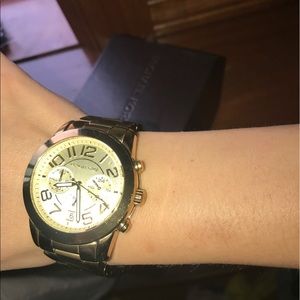 Michael kor's gold watch with 3 extra links