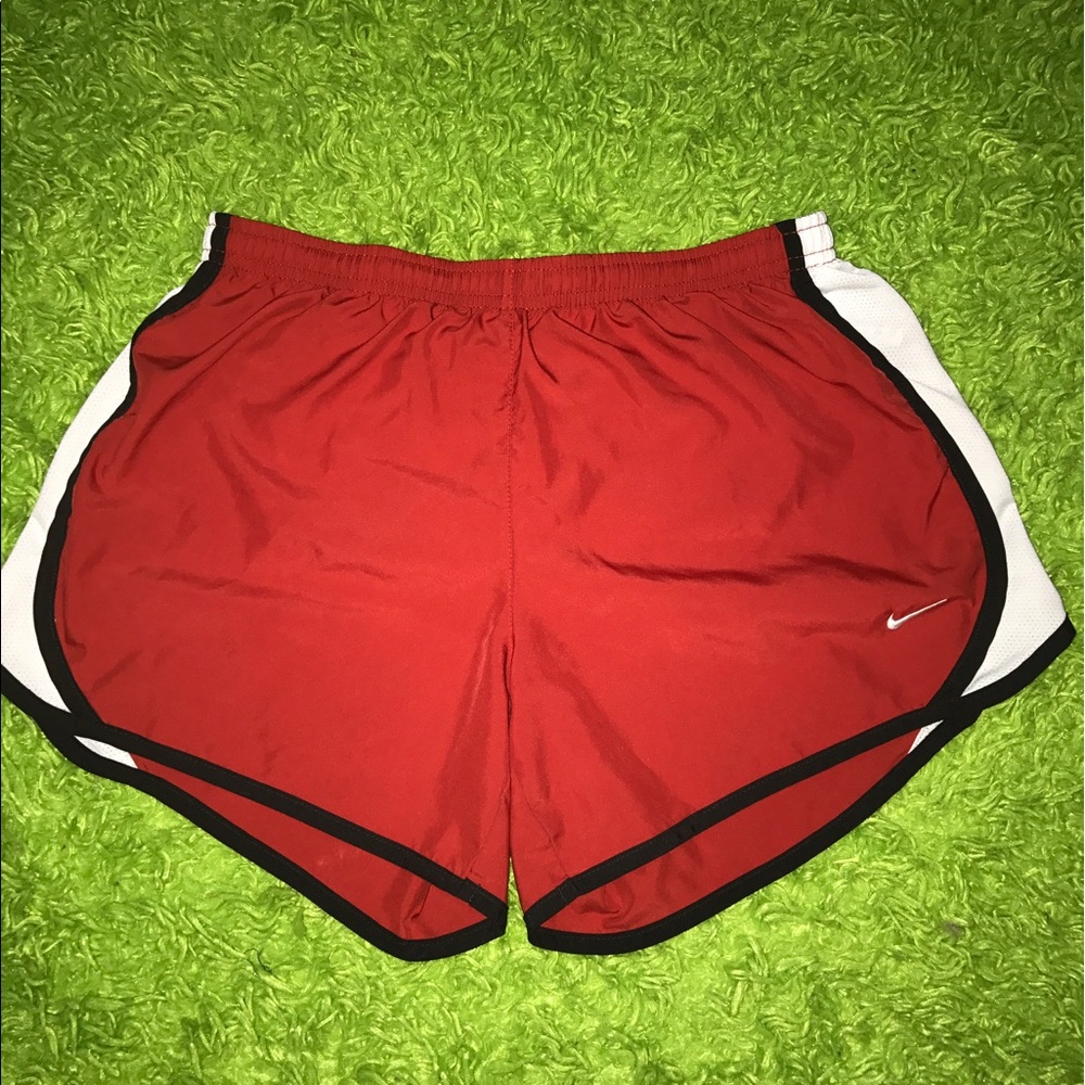 Red Nike athletic shorts