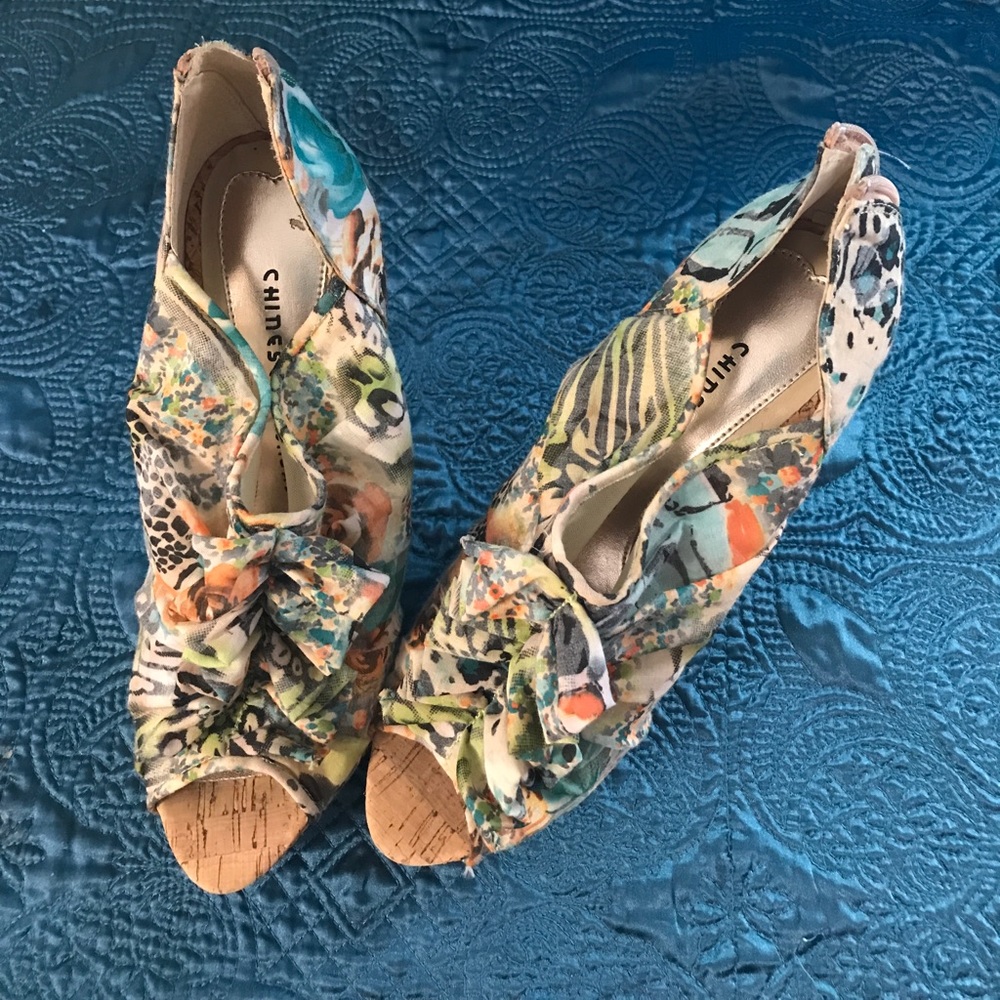 Barely worn multi-colored Peep-toe heels size 10.