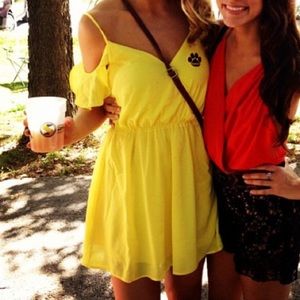 Yellow off-the-shoulder flowy summer dress.