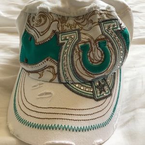 Horse shoe decorated hat