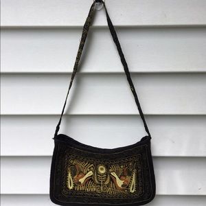 Embroidered bird handbag