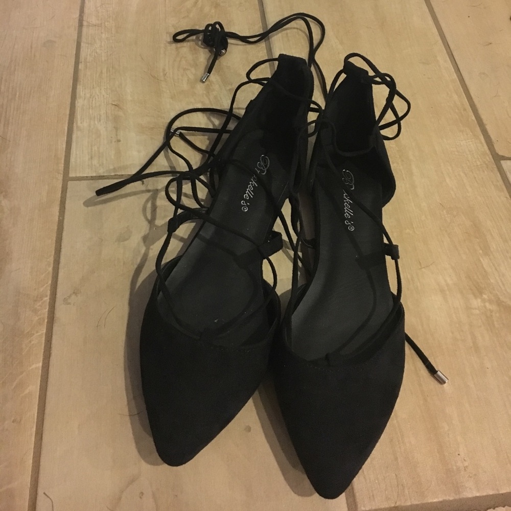 Black lace up pointed toe flats