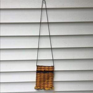 Small yellow crossbody handbag