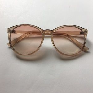 Plastic framed, rose colored sunglasses