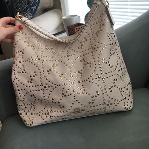 Cream embellished coach purse