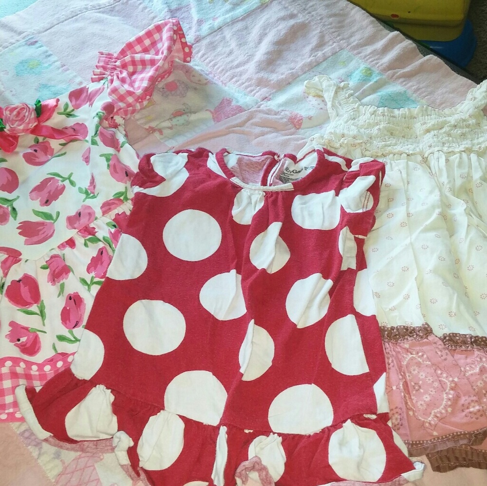 Three baby girl dresses