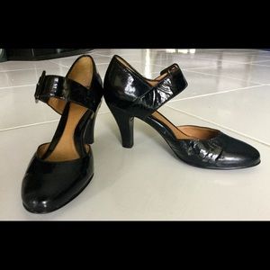 Sofft leather black patent heel.