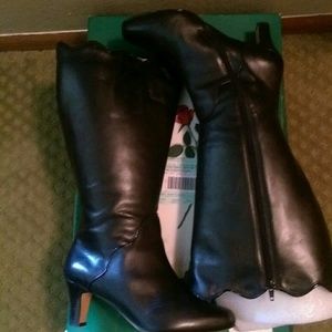 Ros Hommerson knee high boots with scalloped top.