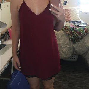 Maroon slip dress with black lace trim