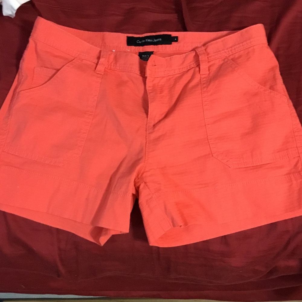 Orange Calvin Klein shorts