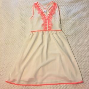 Cream dress with neon orange detail
