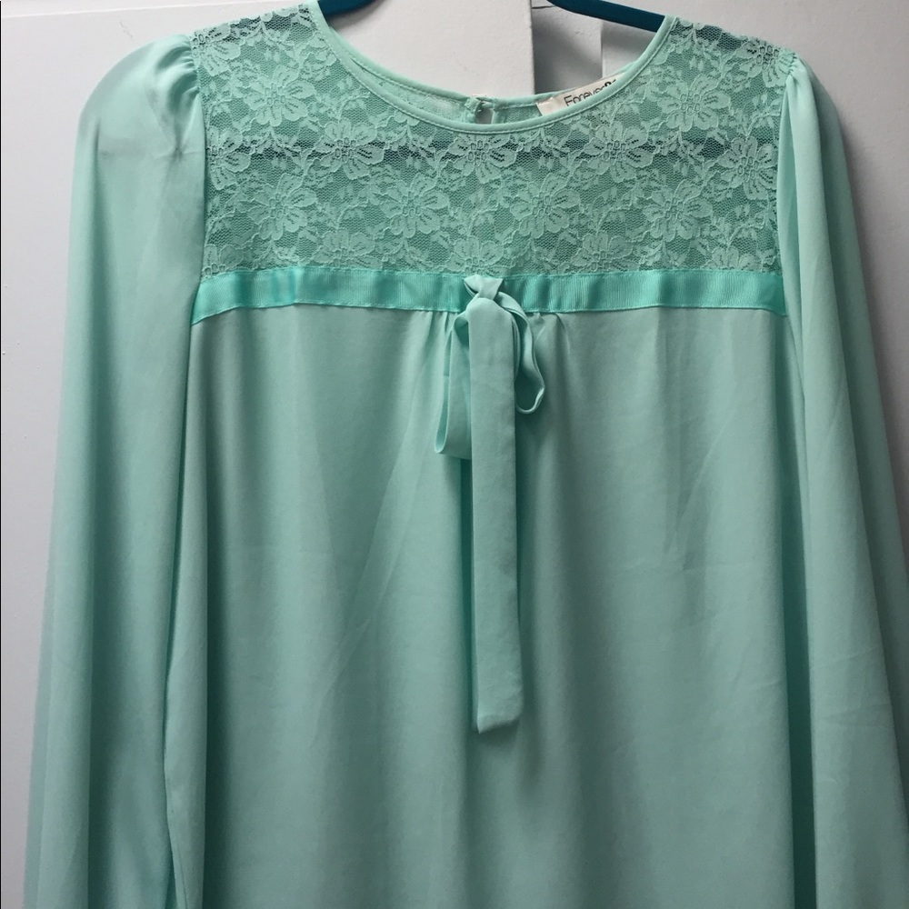 Beautiful lace mint blouse with bow