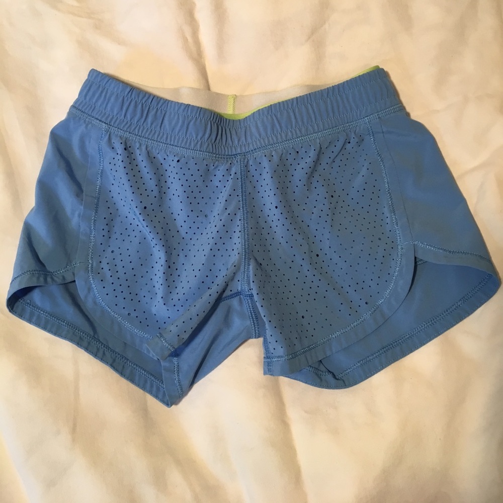 Ivivva blue shorts with mesh pattern. Size 8 girls