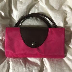 Hot pink tote styled like longchamp