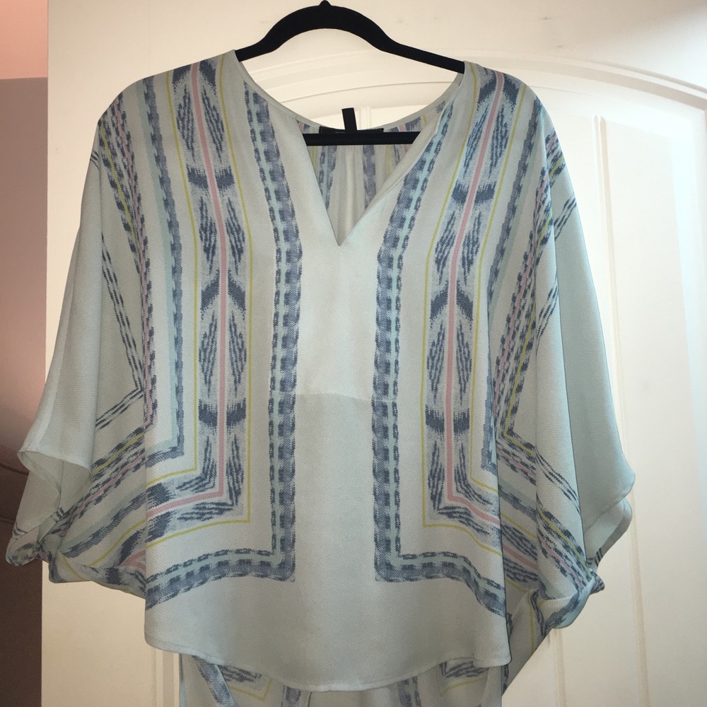 BCBG flowy top, light blue. Mid length sleeves.