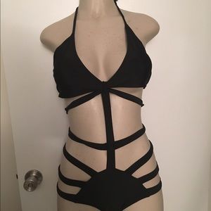 Black strapped romper / bodysuit