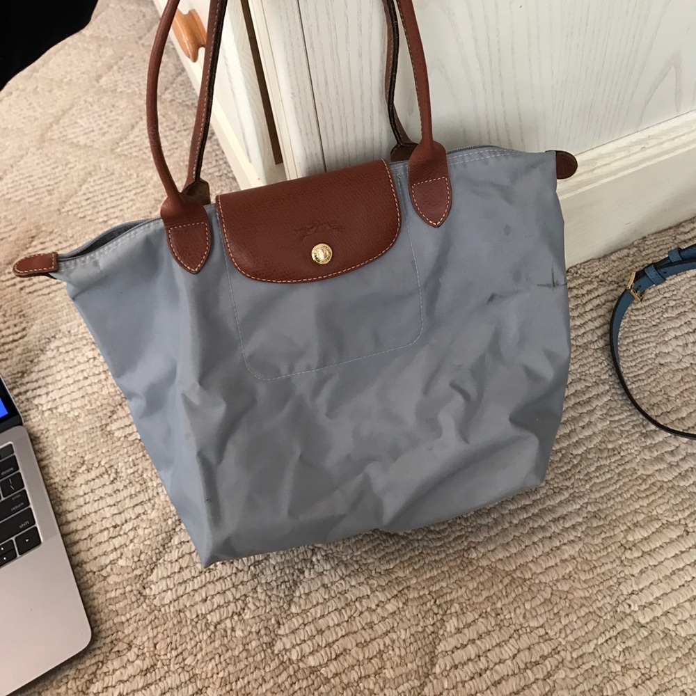 Longchamp medium sized grey purse.