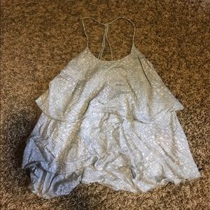 A grey and white hollister tank top